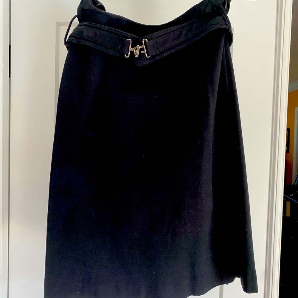 Knee length black skirt